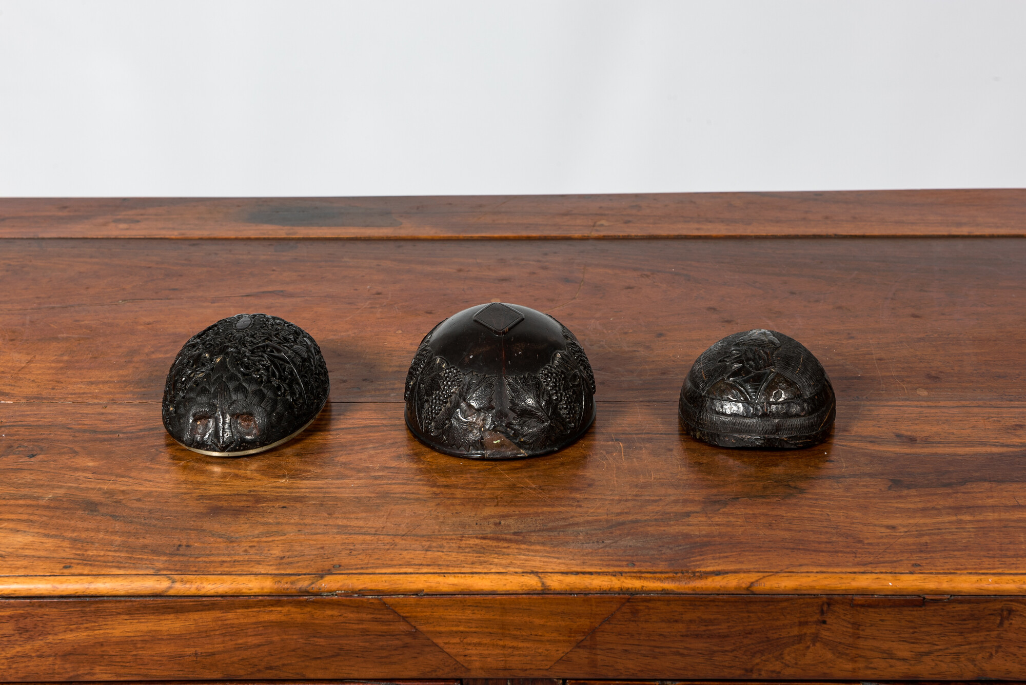 Three carved coconut pendants, French colonies, 19th C. - Image 3 of 3