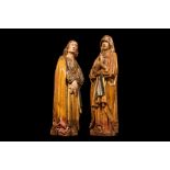 Two large Flemish polychromed and gilt walnut figures of Mary and John the Baptist, Brabant, late 15
