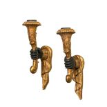 A pair of Italian gilt and blackened wood 'blackamore' wall appliques, 20th C.