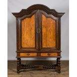 A mahogany two-door cabinet on foot, 19/20th C.