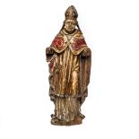 A polychromed and gilt basswood figure of a bishop, 18th C