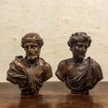 A pair of Italian walnut busts of males, 17th C.