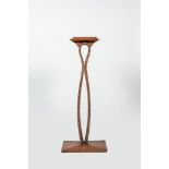 A faux-bamboo carved wooden lamp stand, 1st half 20th C.