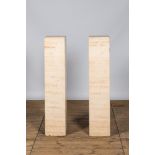 A pair of Italian travertine pedestals, 20th C.