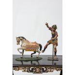 Two polychrome wooden figures of a Roman soldier and a horse, 17/18th C.