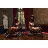 A pair of walnut sculptures of Greek goddesses, 18th C.