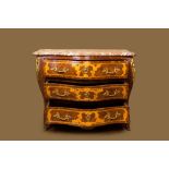 A French mahogany veneered commode a tombeau with floral marquetry, marble top and gilt bronze mount