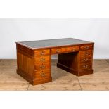 An English mahogany writing desk with leather top, ca. 1900