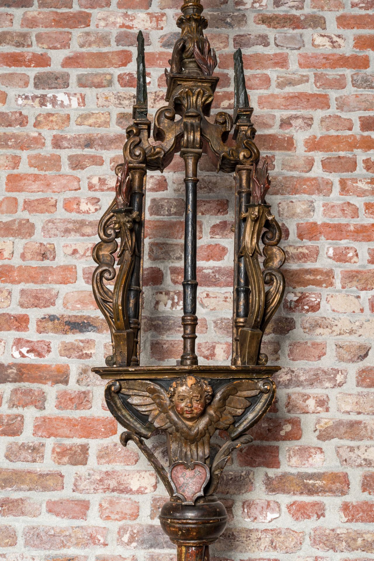 A pair of large polychromed and gilt processional torches with cherub heads, 18th C. - Image 4 of 6