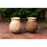 Two French partly glazed terracotta jars, one marked Antoine Rissy, 19/20th C.