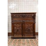 A Flemish oak 'columns' cupboard, 17th C. with later elements