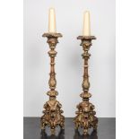 A pair of large painted wooden candlesticks, probably Italy, 18th C.