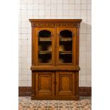 An oak display cabinet with meander decoration, ca. 1900