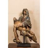 A large polychromed walnut Pieta, 1st half 16th C.