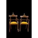 A pair of North African bone-inlaid wooden chairs with silk upholstery, 19th C