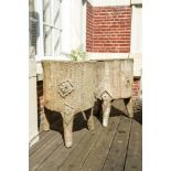 A pair of faux-bois tripod planters, 20th C.