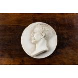 An English white marble medallion depicting the profile portrait of John Peyto Charles Shrubb, dated