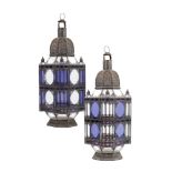 A pair of large Moroccan metal and glass lanterns, mid 20th C.