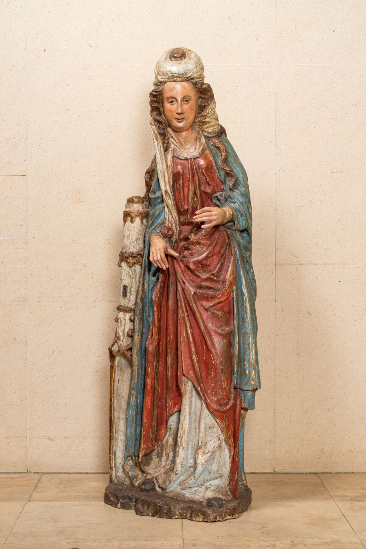 A large polychromed wooden figure of Saint Barbara, -Southern Netherlands, mid 16th C.