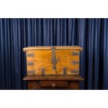 A wooden trunk with wrought iron mounts, 18th C.