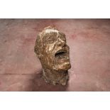 A large patinated terracotta head of a laughing man, 1st half 20th C.