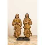 A pair of polychromed and gilt wooden figures of kneeling and praying angels, ca. 1700