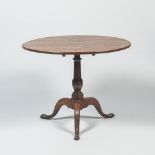 An English oak folding table, 19th C.