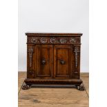 An Italian walnut two-door cabinet, 18th C.