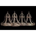 Four large bell-shaped bronze chandeliers, first half 20th C.