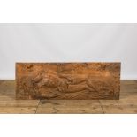 An oak wooden 'reclining Christ surrounded by angels' relief, 17th C. or later