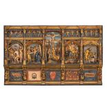 A large Flemish polychrome walnut retable, probably Ghent, dated 1529