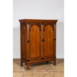 A Dutch oak two-door cupboard with ebonised elements, 17th C.