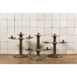 Three adjustable punched copper candlesticks, 19th C.