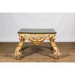 An Italian polychrome and gilt wooden baroque style table, 19th C.
