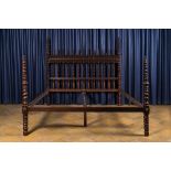 A Portuguese wooden four-poster bed, probably 19th C.