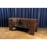 A large German rectangular wooden 'Stollentruhe' chest with iron and brass mounts, Westphalia, 17th