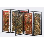A pair of three-part black lacquered folding screens with collages of historical characters, 19/20th