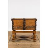 An iron-mounted pine chest on foot, dated 1661, 17th C. and later