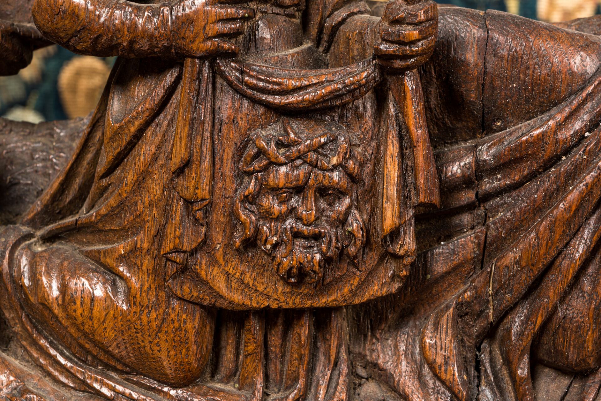 A Flemish carved oak retable fragment depicting the 'Road to Calvary with Saint Veronica', 16th C. - Image 7 of 8