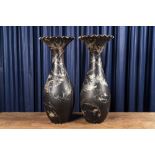 A pair of large mother-of-pearl-inlaid black-lacquered Japanese vases with fan-shaped rims, Meiji, 1