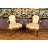 A pair of French Louis XV walnut chairs, 18th C.