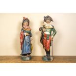 A pair of polychrome terracotta figures of a man and a woman, 18/19th C.