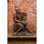 A large polychrome wooden sculpture of a Roman soldier, 19th C.