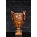 A large patinated stoneware urn with mythological decors, France, 19th C