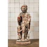 A large polychrome limestone 'Saint Roch with boy and dog' group, 17/18th C.