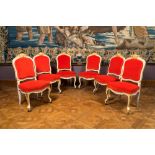 Six partly gilt wooden chairs with red velvet upholstery, 18/19th C.