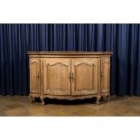 A French oak wooden four-door sideboard, 18/19th C.