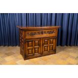 A Spanish wooden dresser with two doors and one drawer, 17th C.