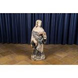 A polychrome limestone figure of Saint Scholastica, Loire Valley, 16th C.