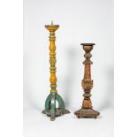 A polychromed wooden 'torchre' and a large candlestick, 18th and 19th C.